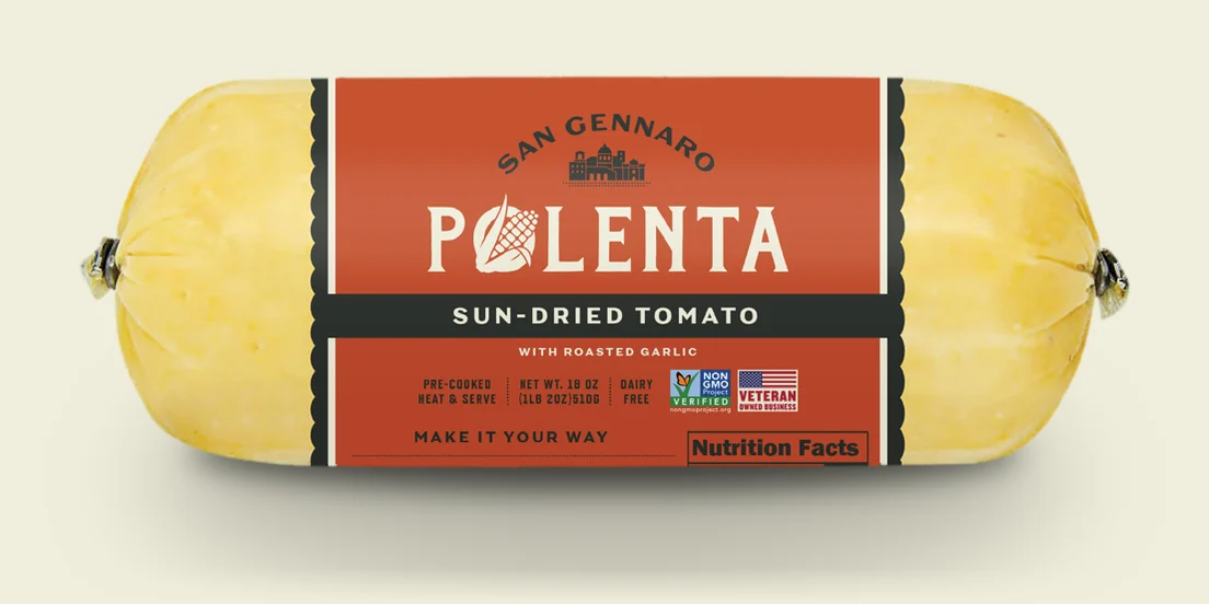San Gennaro Sun-Dried Tomato Polenta, an 18 ounce roll with a tomato red label and a charcoal flavor band.